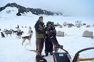 Alaska dog mushers leading glacier tour.
