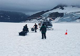 Heli drop at glacier dog sledding camp