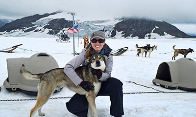 Alaska remote dogsled tours on a scenic glacier.